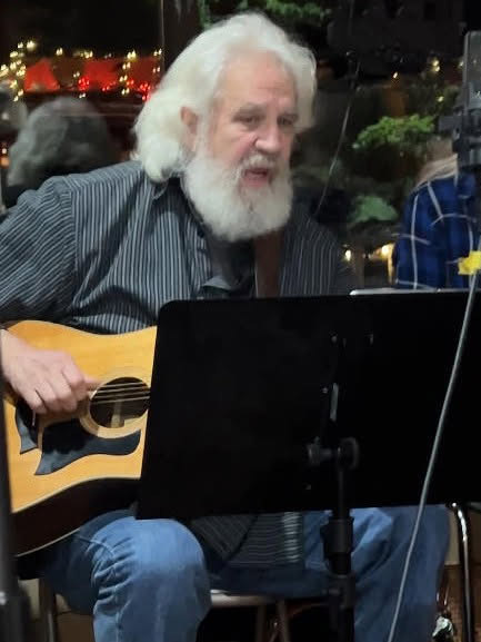 Steve performing on stage